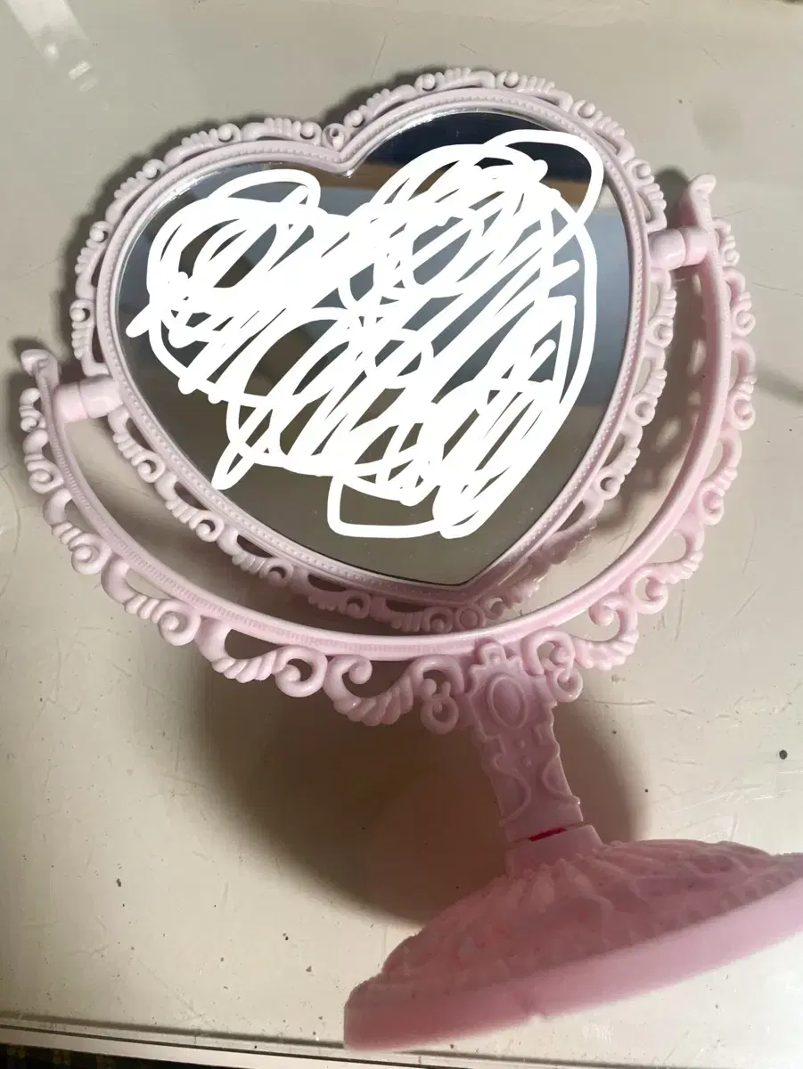 Double-sided desk mirror with a heart