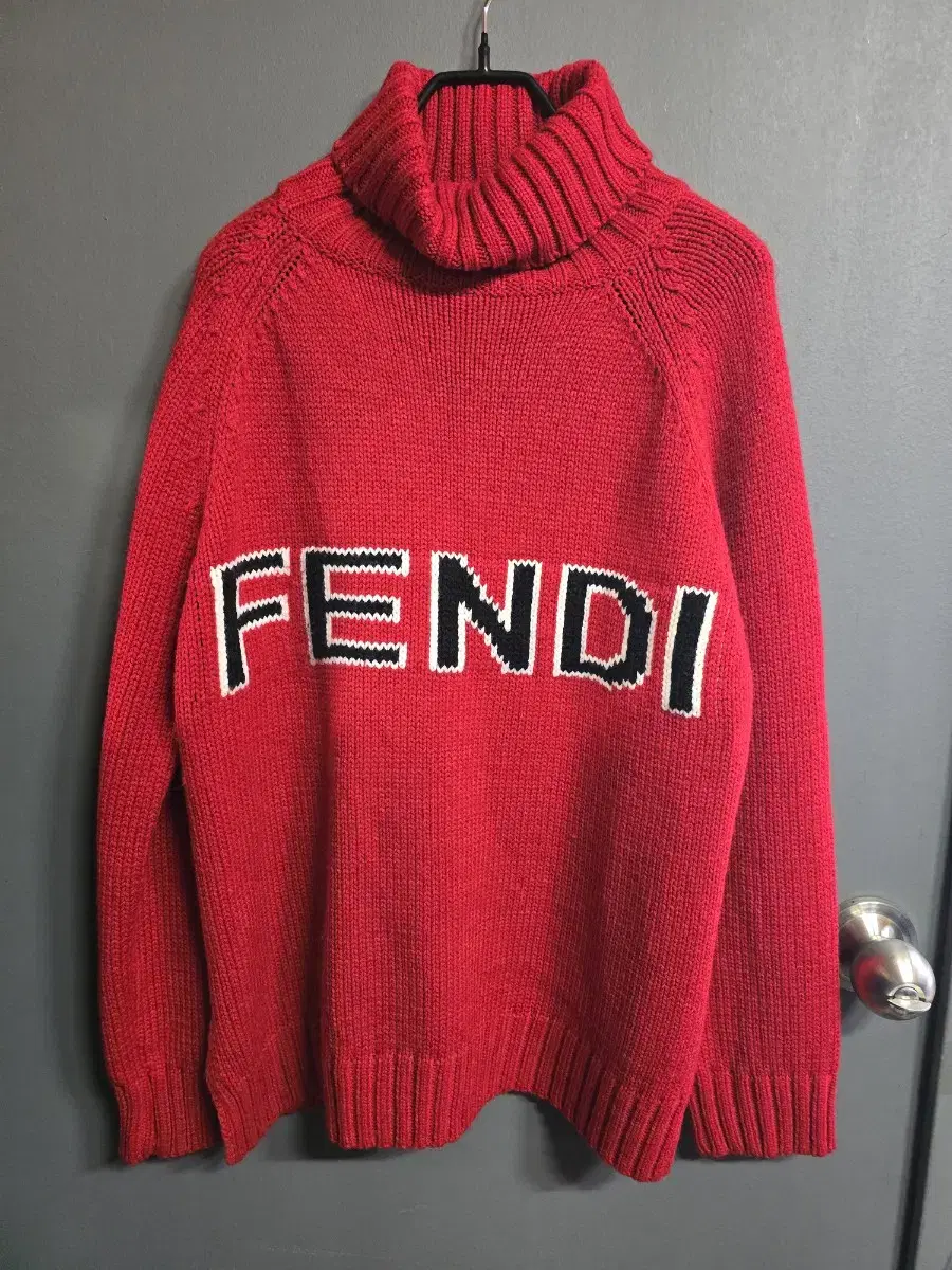 Fendi red pola knit (please note that the inner tack has been removed for sizing).