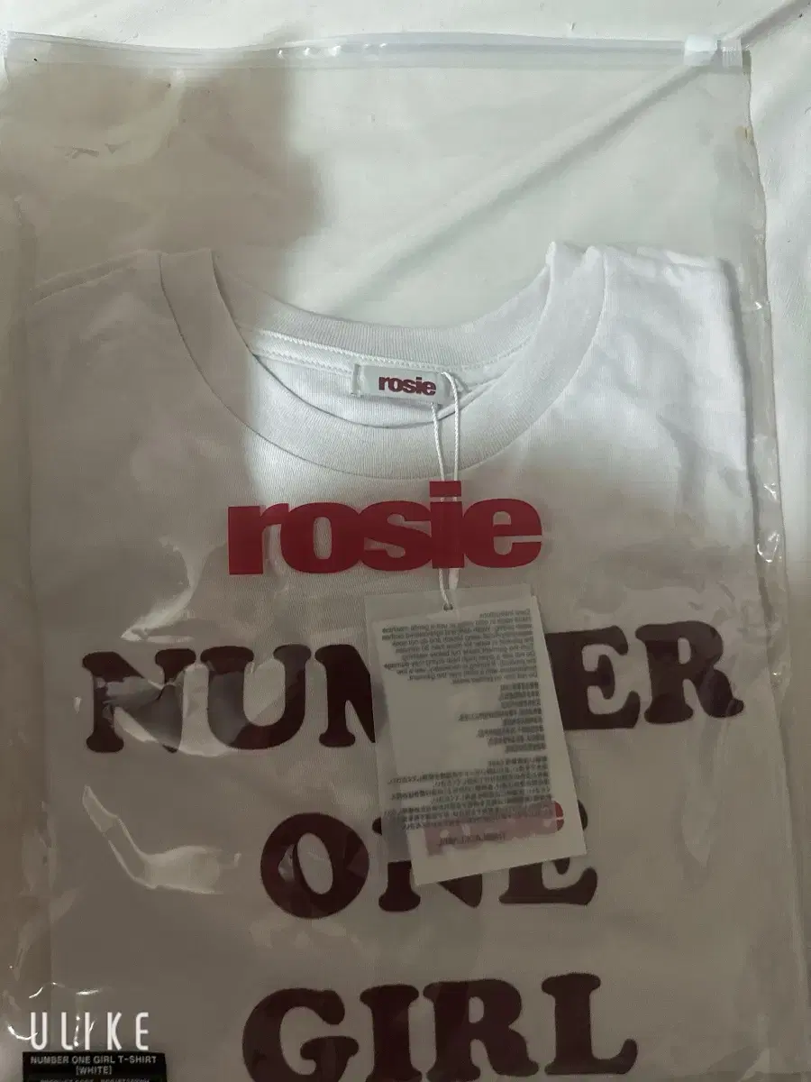 Unsealed rose pop up I'm selling my number one girl t-shirt in white color.