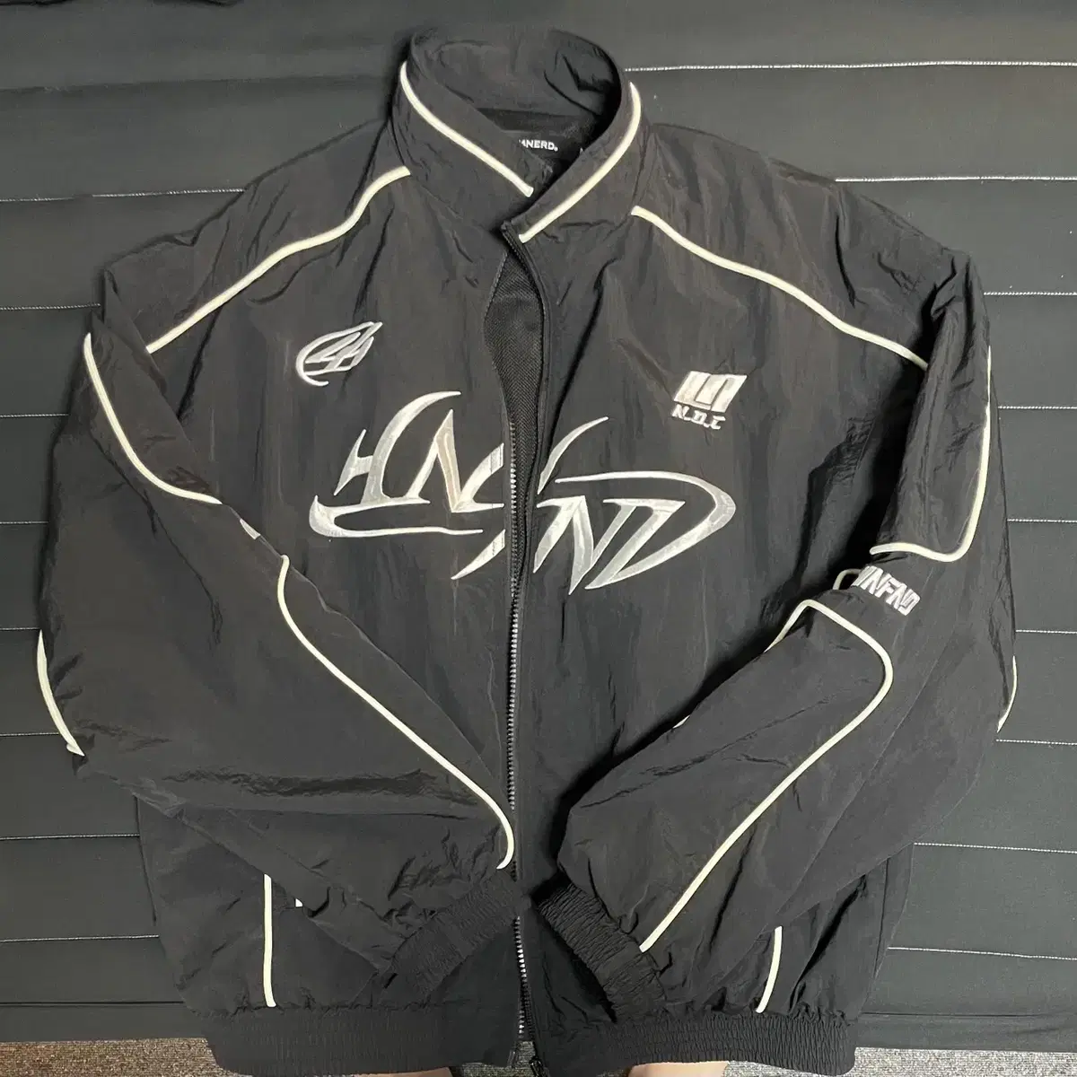 낫포너드 Tribal Logo Nylon Racing Jacket