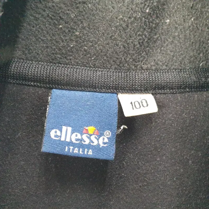 F2157 ELLESSE 남100 플리스 블랙 집업 베스트/더크