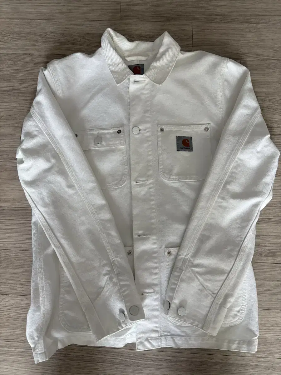 Sell me a white Calhart jacket