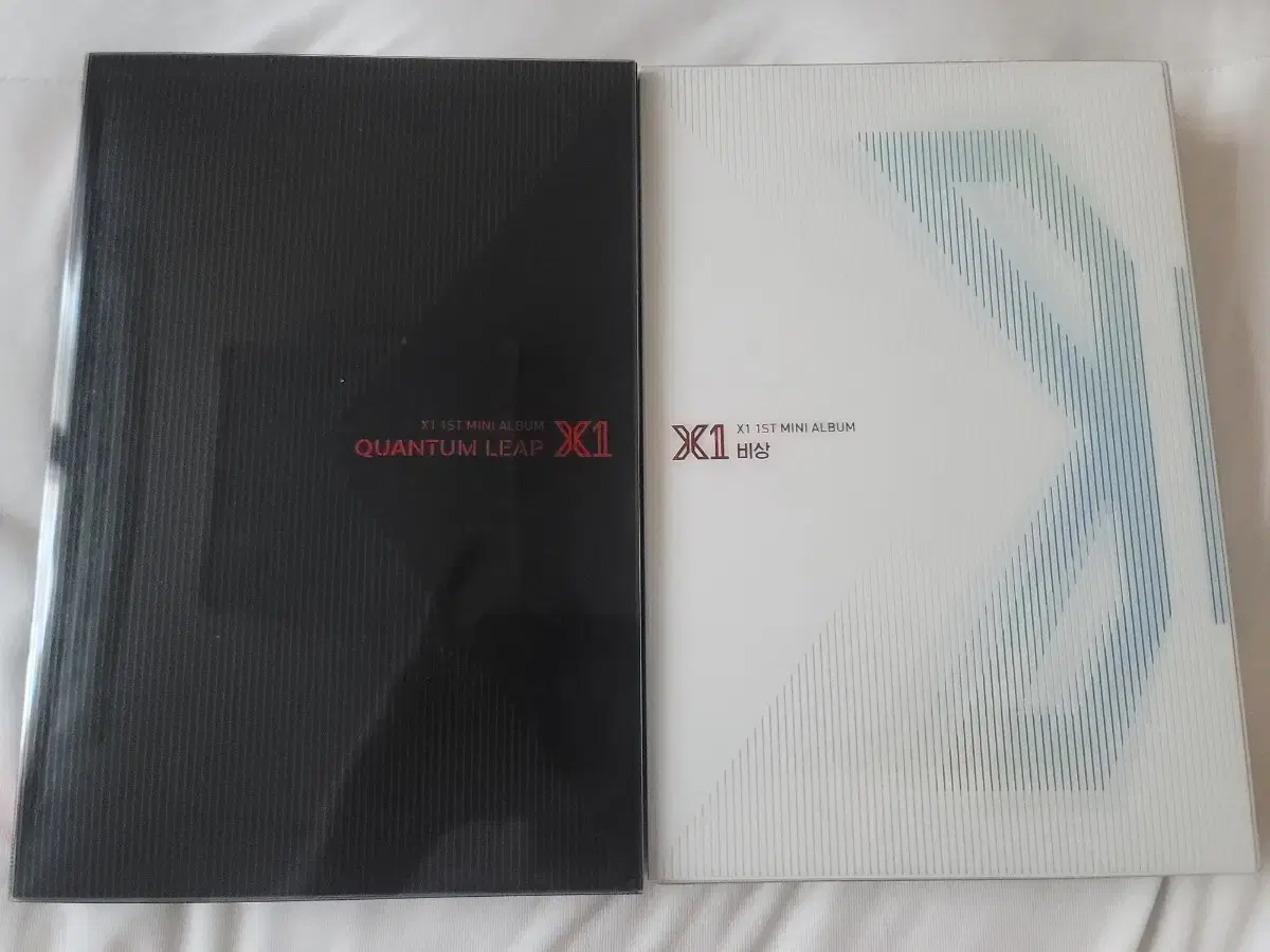 X1 sells 2 emergency albums