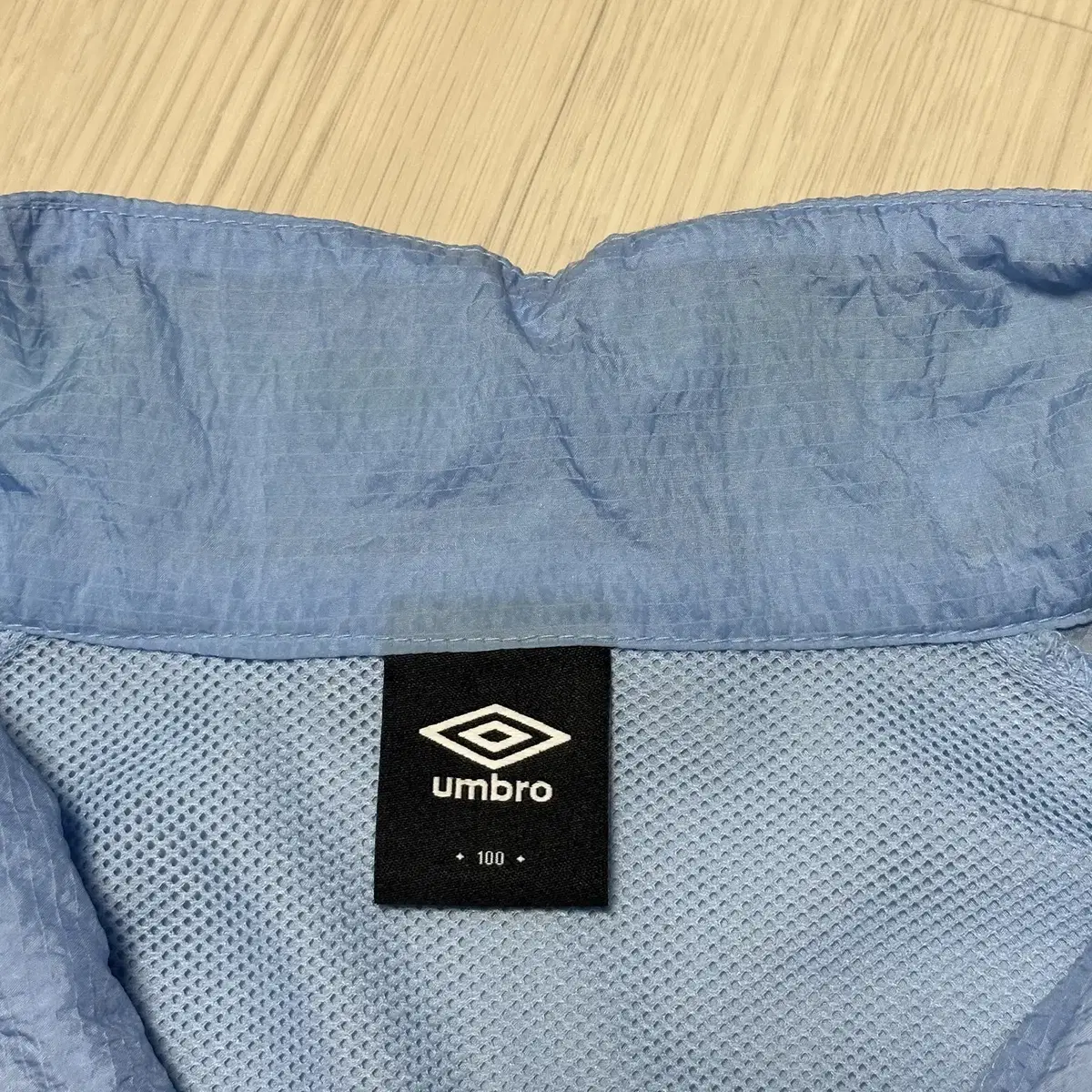 [L] 엄브로 UMBRO 크링클 스탠넥 바람막이 자켓 라이트블루