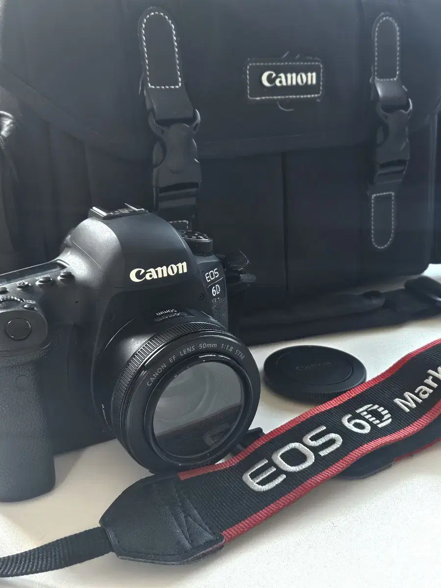 Canon EOS 6D Mark II body + 50mm lens