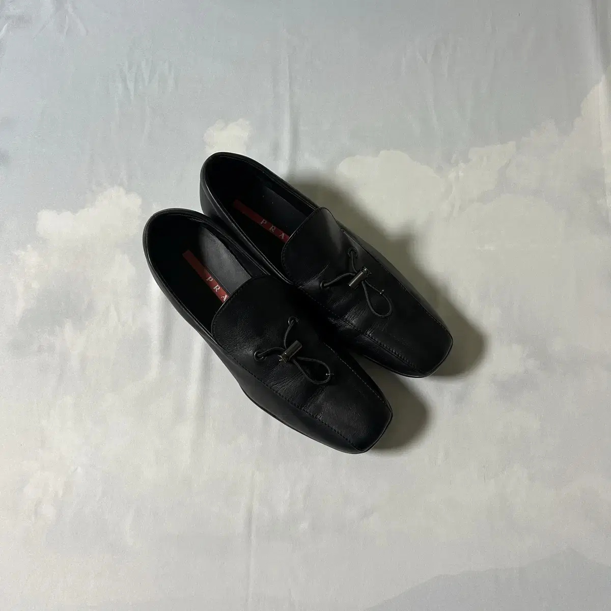 Prada nappa toggle slipon loafers