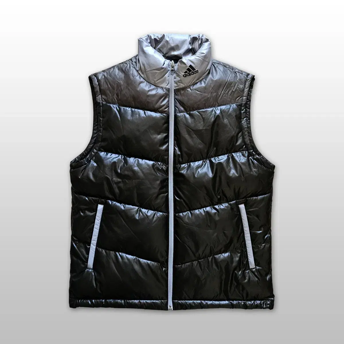 [Adidas] Black and gray padded vest.