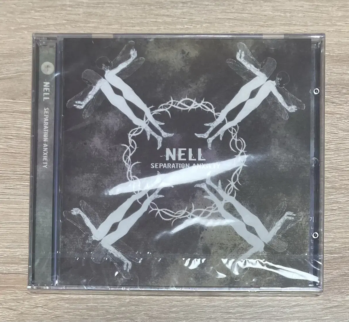 Nell's four CDs sell (unsealed and early).