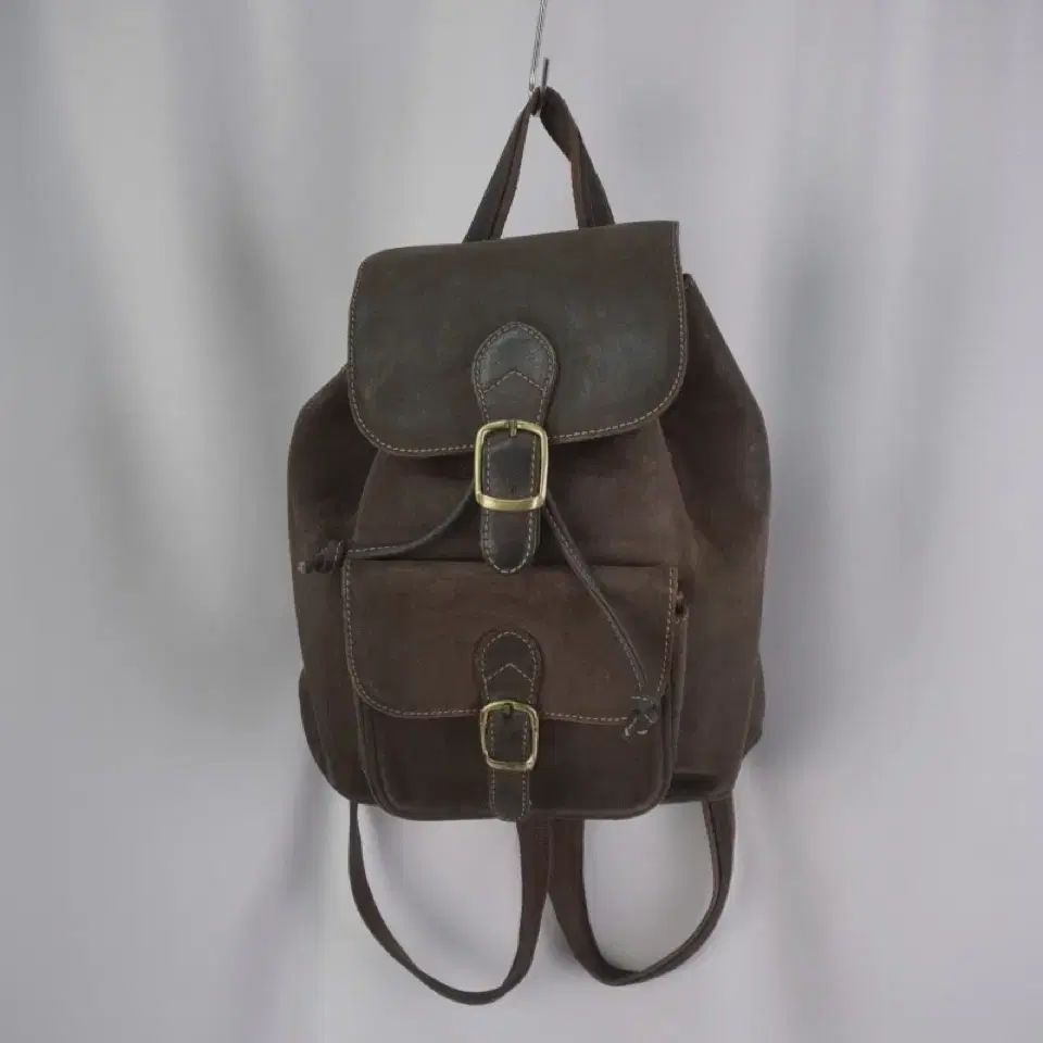 brown leather back pack