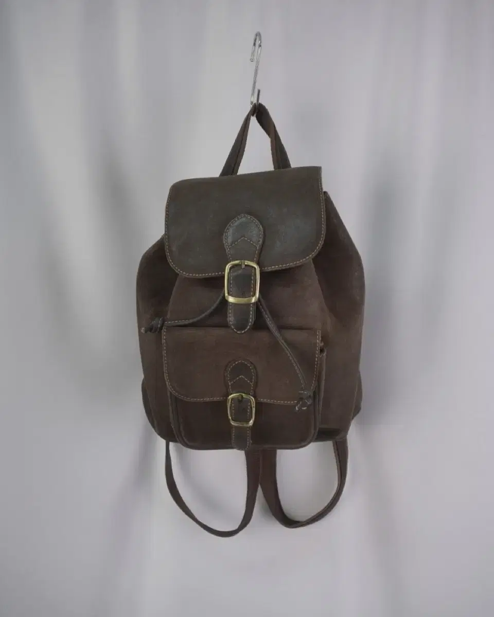 brown leather back pack