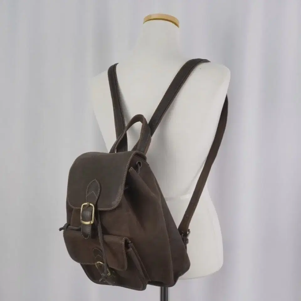 brown leather back pack