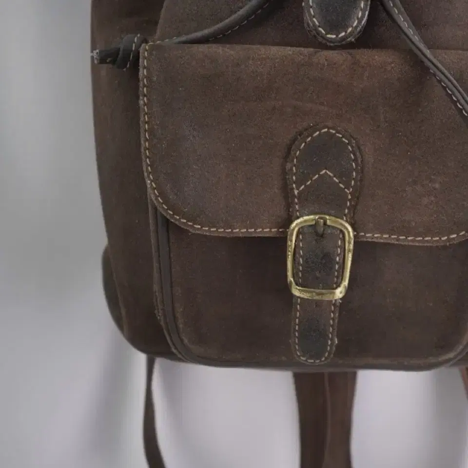 brown leather back pack