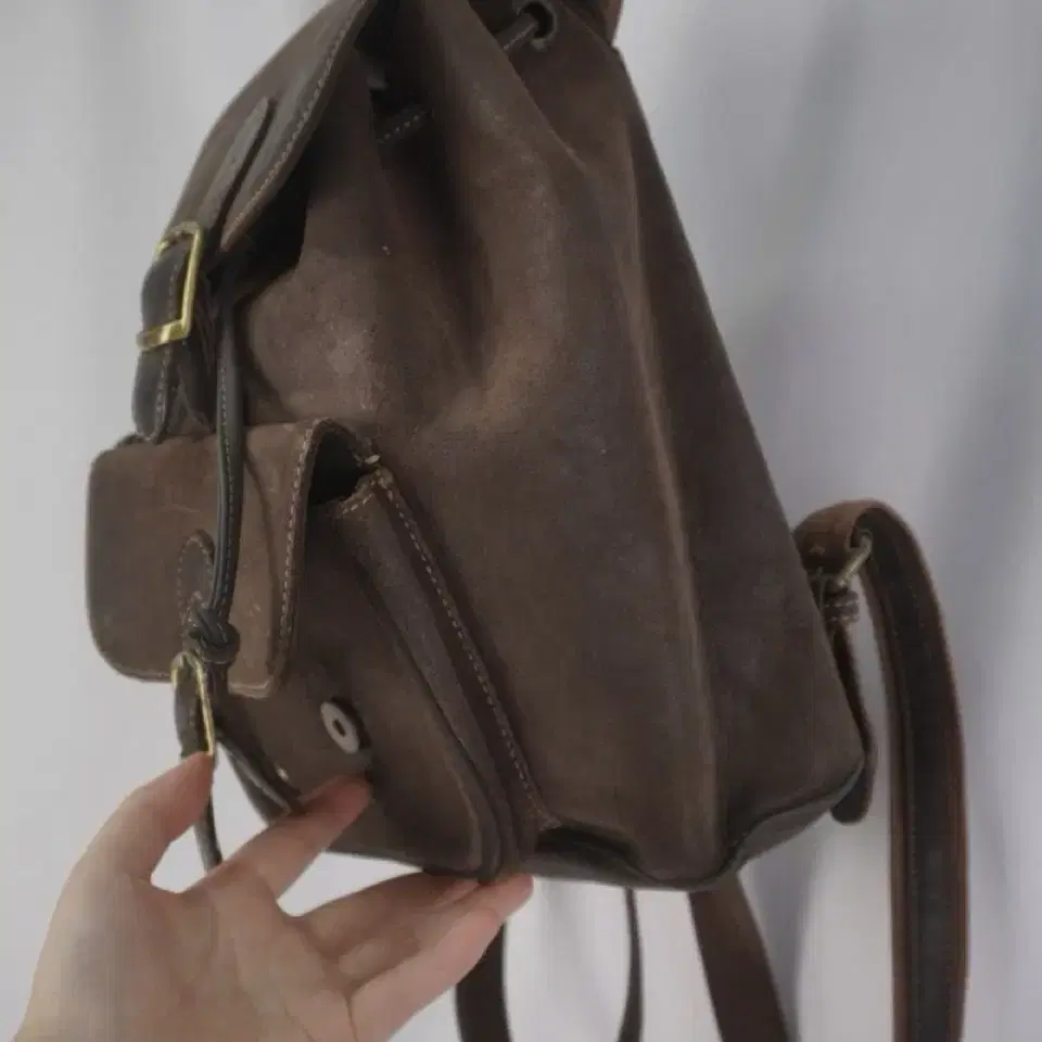 brown leather back pack