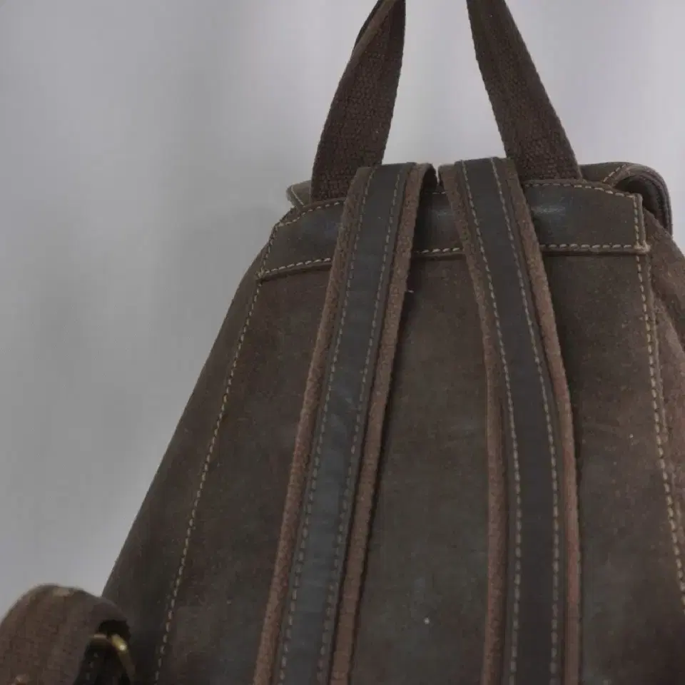 brown leather back pack