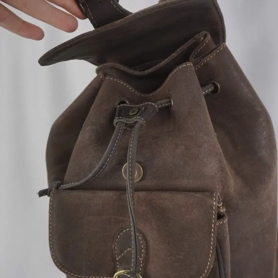 brown leather back pack