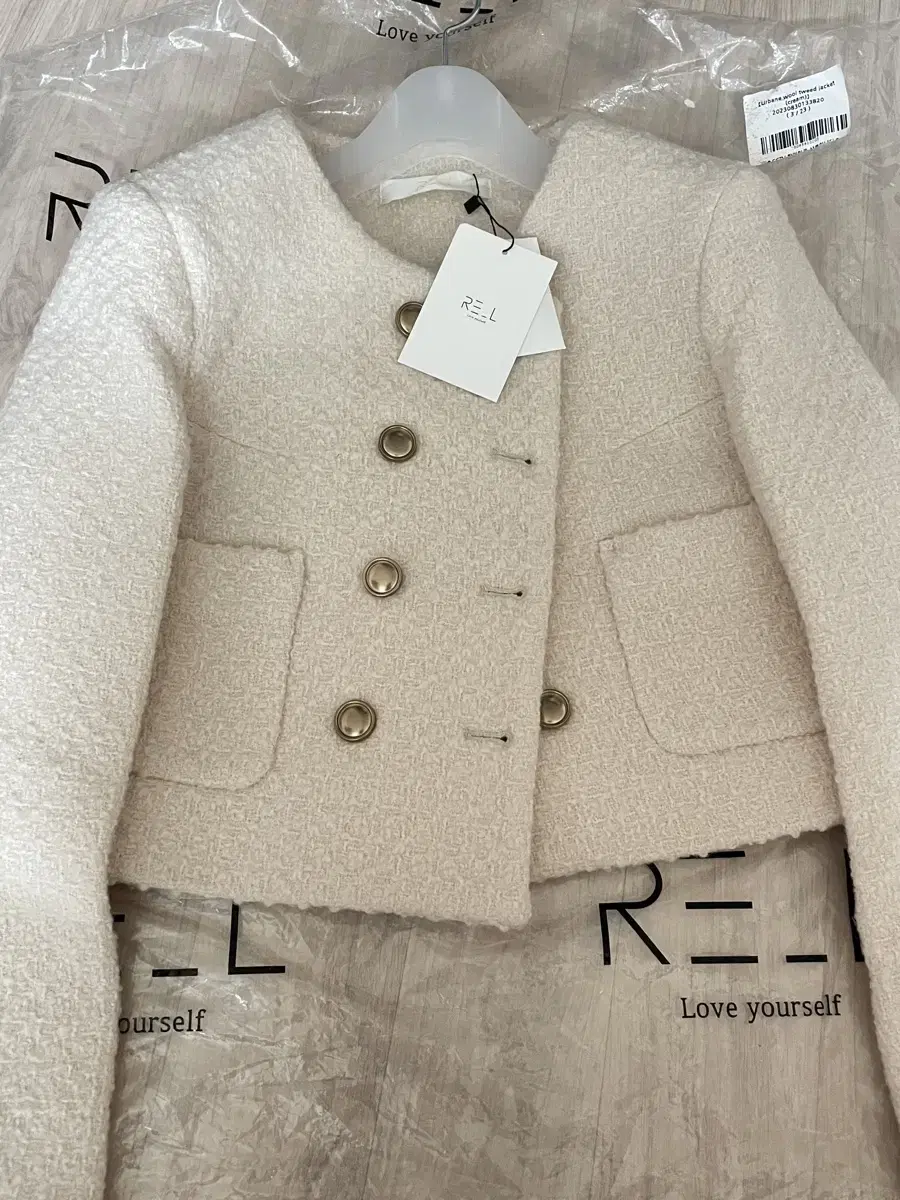 리엘 Urbane wool tweed jacket cream