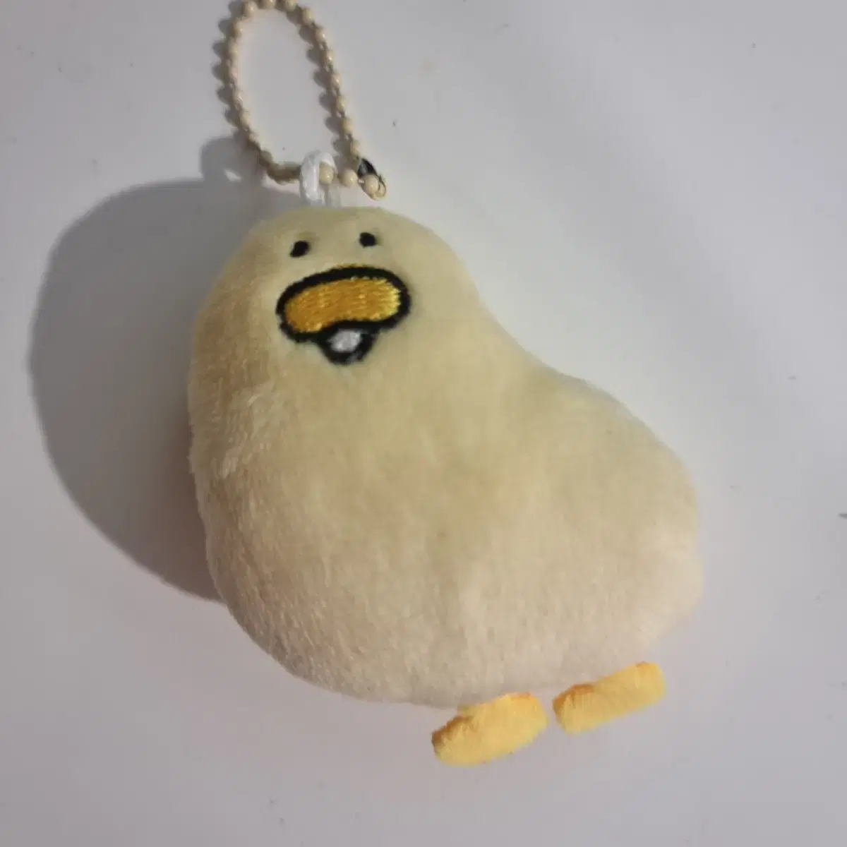 Cheeseduck doll amulet keyring