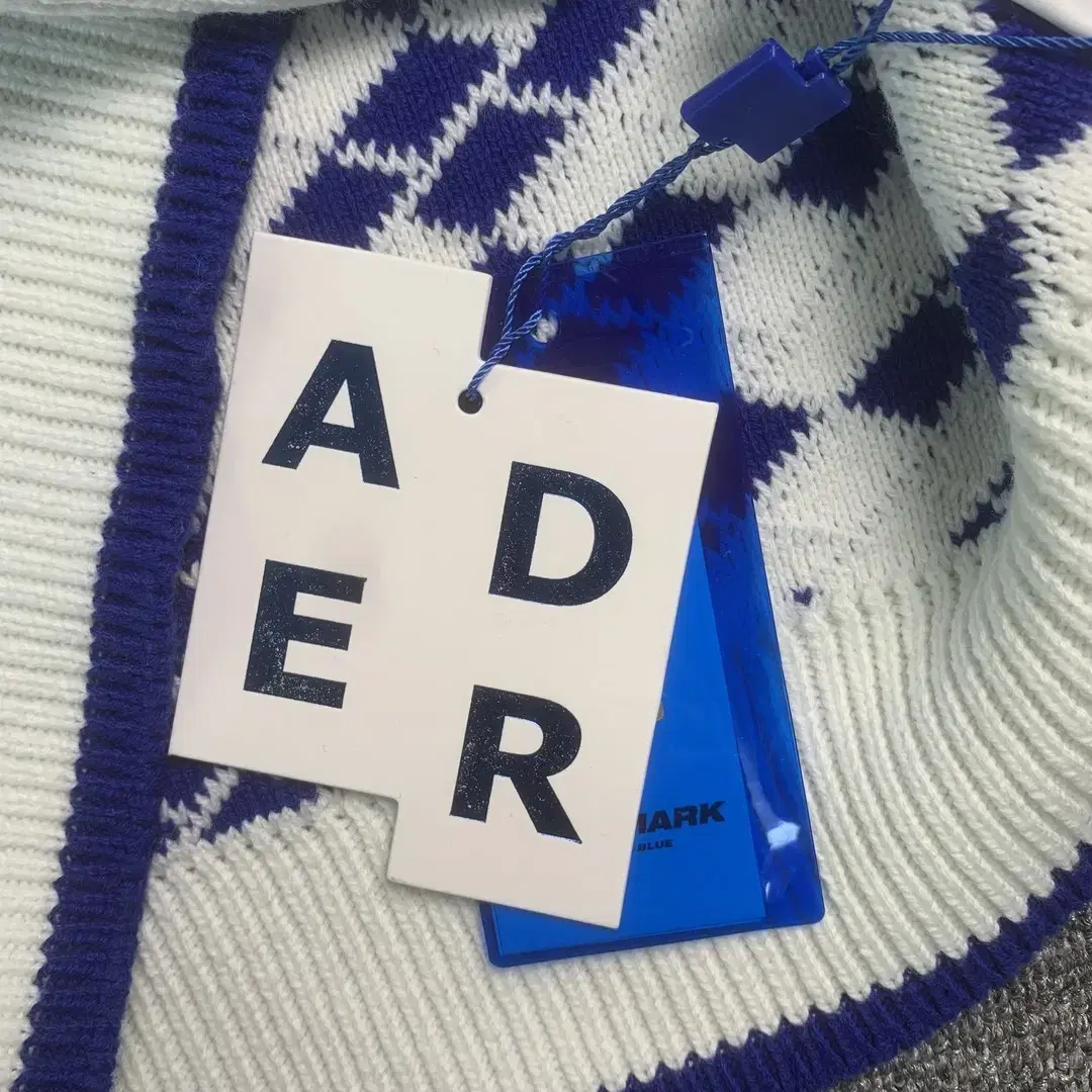 ADER 오류 스웨터