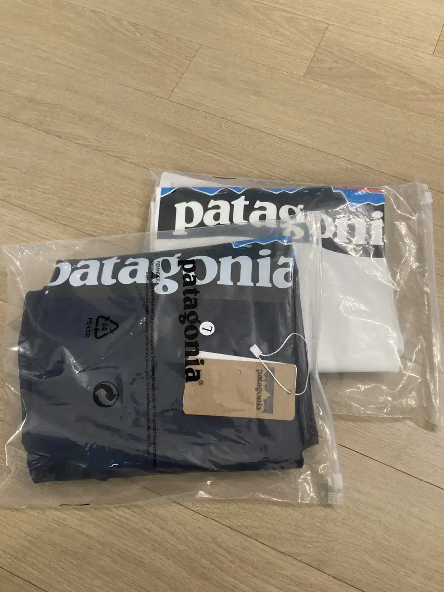 Patagonia white long sleeve tee, size L (about 100)