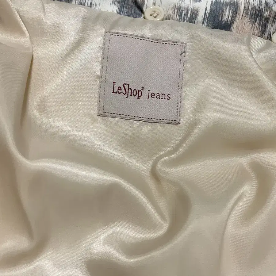 LESHOP 르샵 레오파드 프린트 오리털 여성 패딩