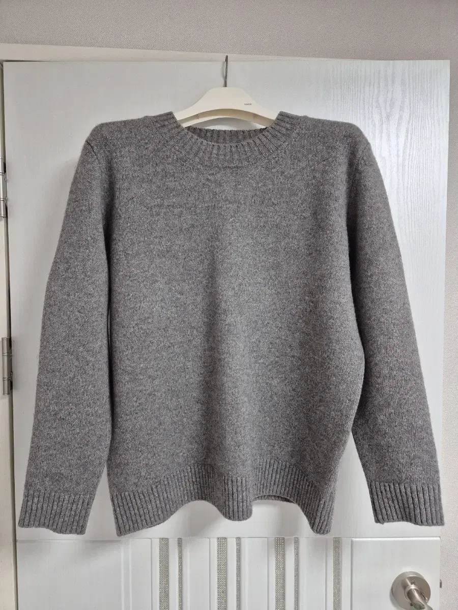 Pile-up pullover sweater at the belly in melange gray