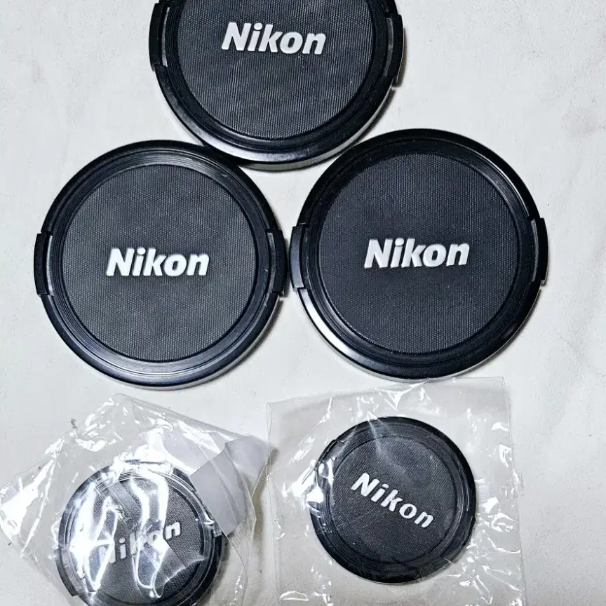 니콘 필카렌즈 앞캡 52mm , 77mm