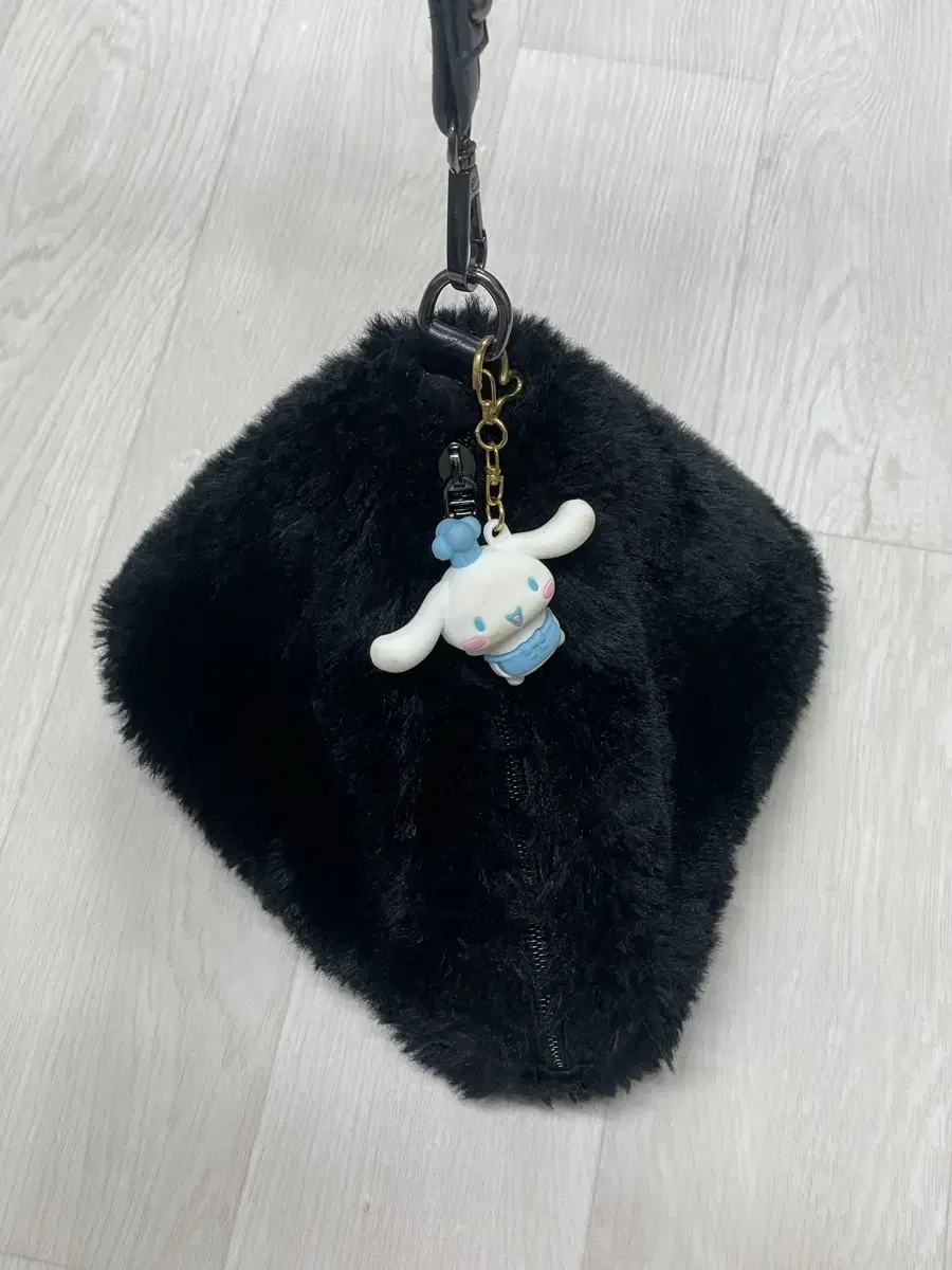 Triangular fur handbag