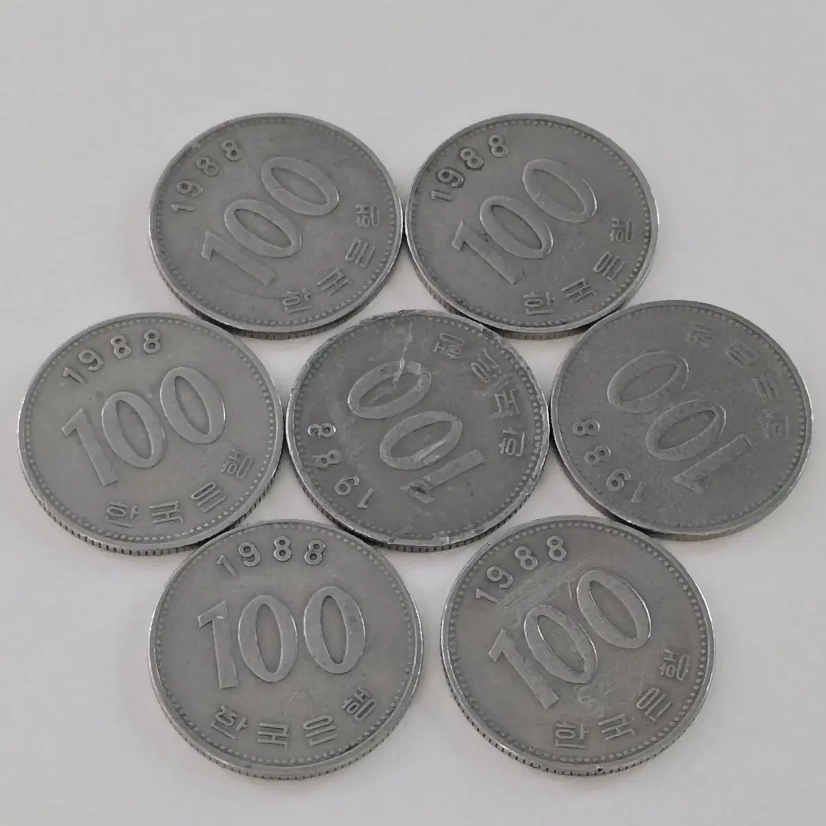 1988년 100원 동전 7개