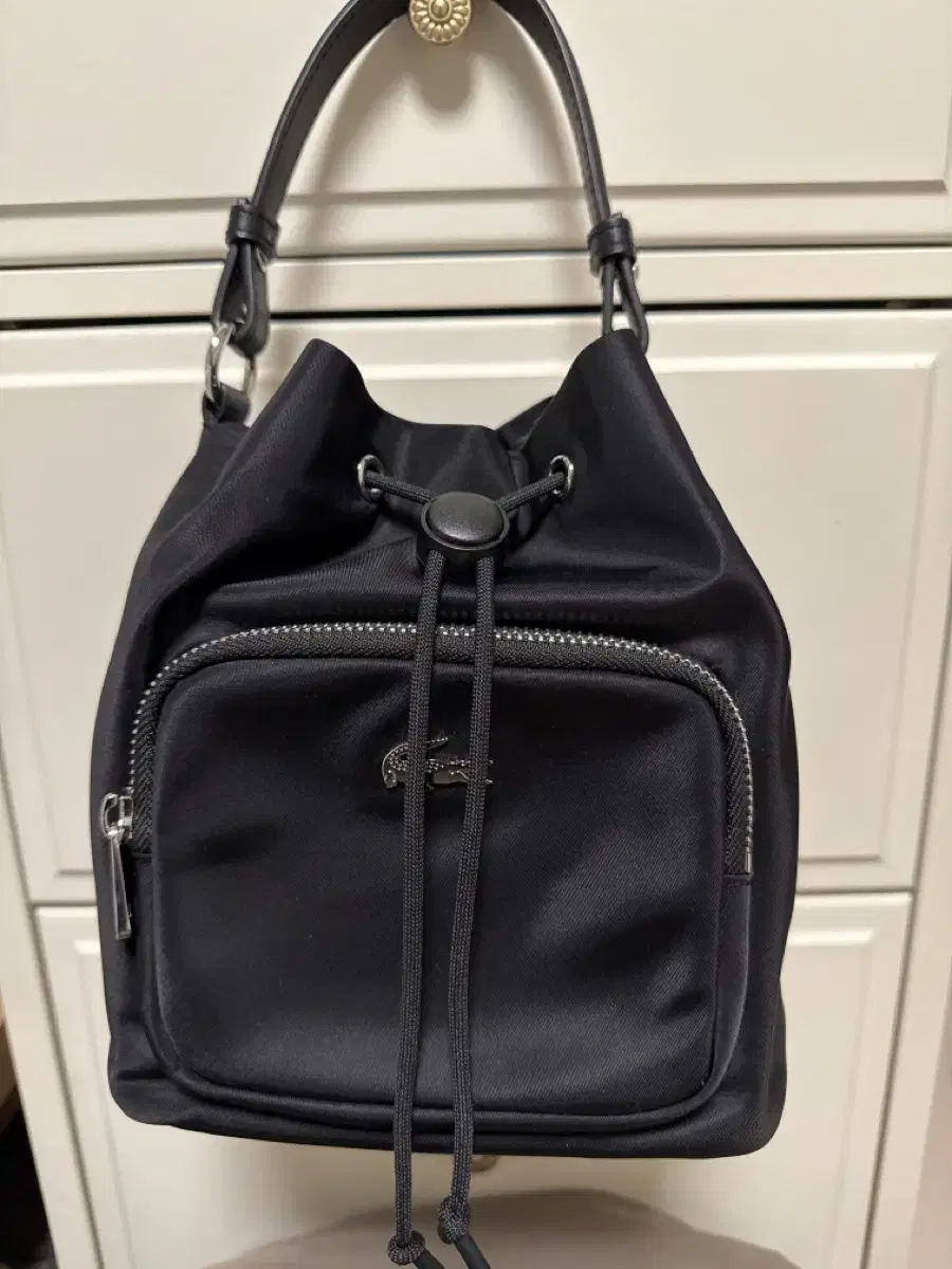 Lacoste e.ji bucket crossbody bag for sale (20000 won with bag)