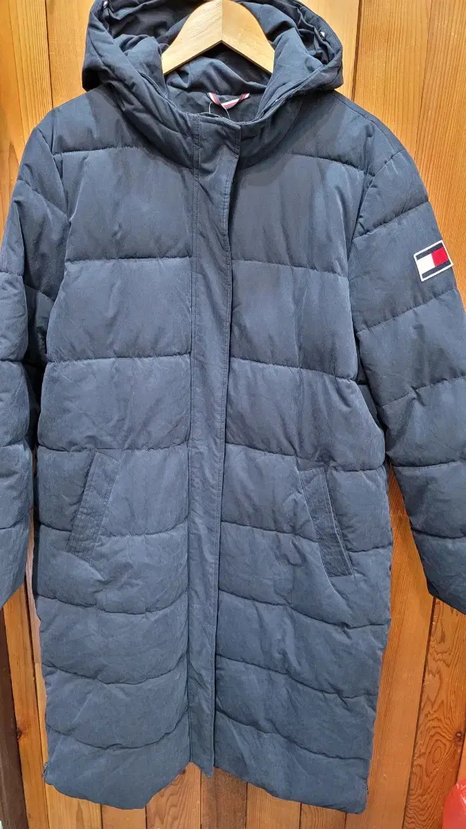 Tommy Hilfiger Long Padding is sized XL unisex