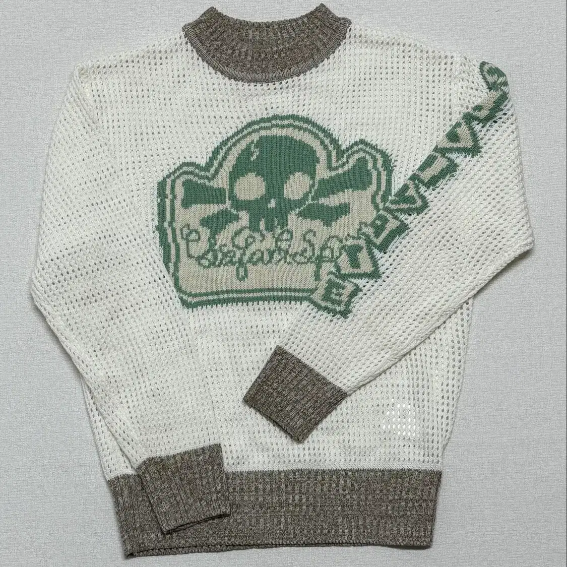 사파리스팟 니트 MULTI SKULL MESH KNIT