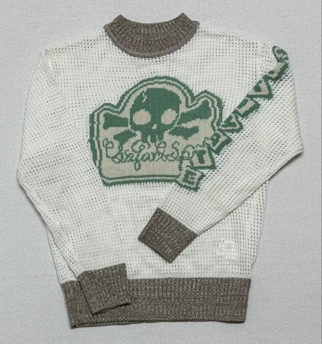 사파리스팟 니트 MULTI SKULL MESH KNIT