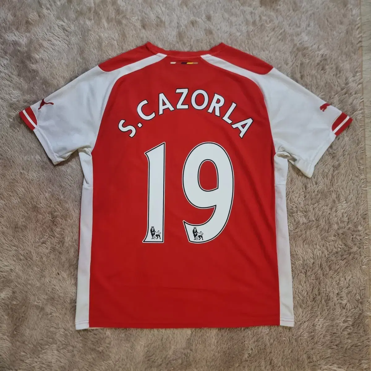 Santi Cazorla with Arsenal home shirt #19 for the 2014-15
