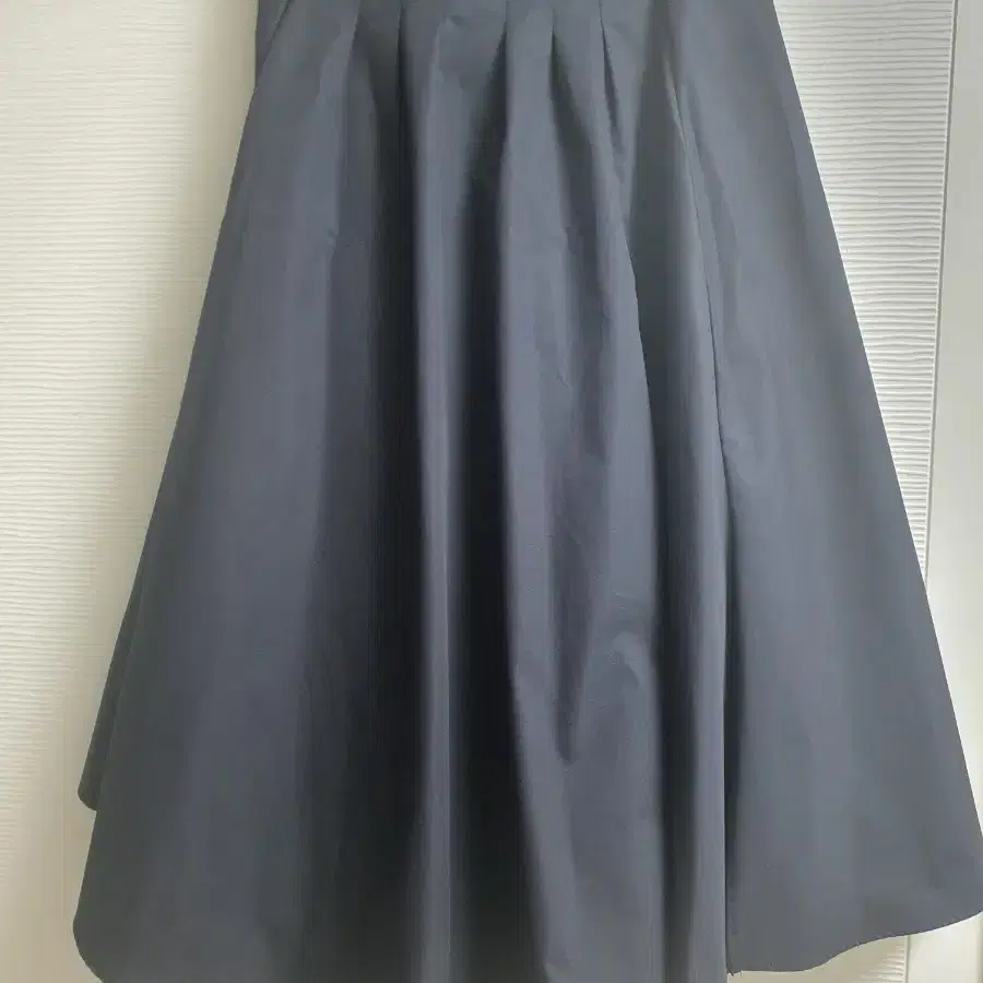 망고매니플리즈 스커트 CURLY FLARE SKIRT 컬리 스커트 플레어