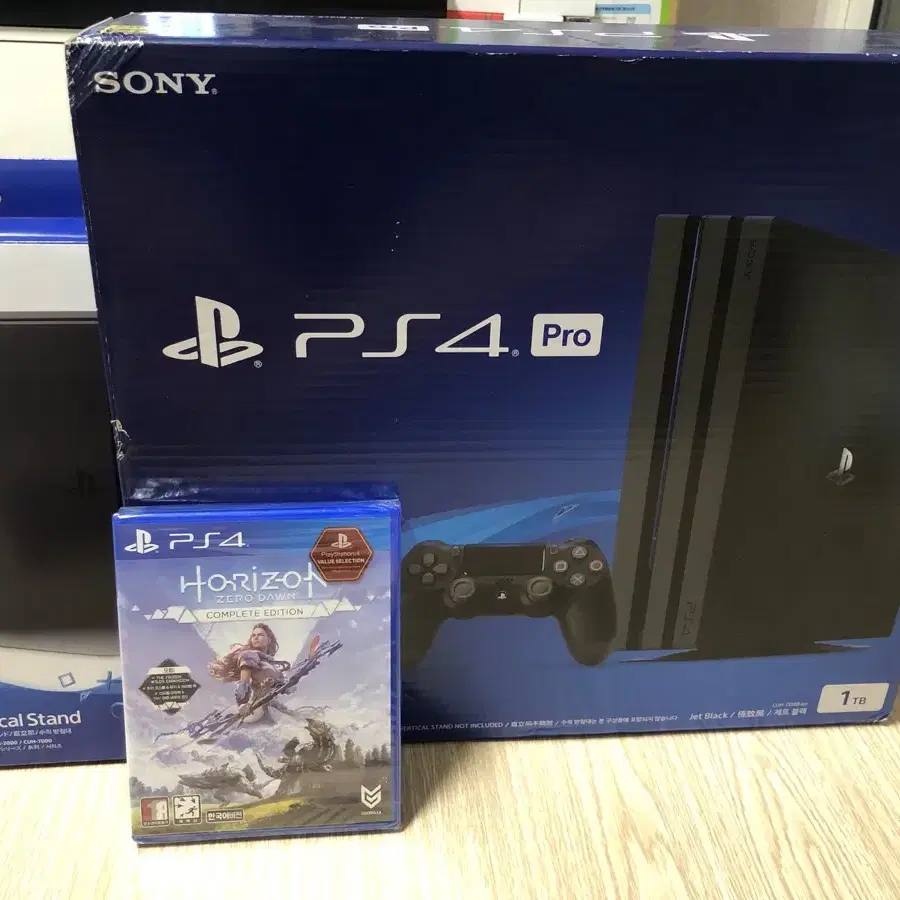 ps4 pro 1tb+조이패드2개+스탠드+게임CD새것