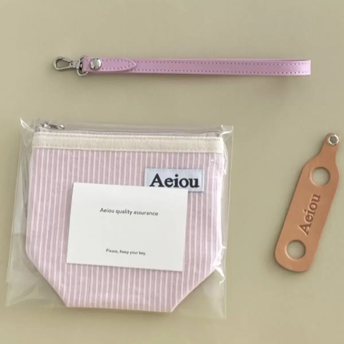 아에이오우파우치 stripe organic pink M size