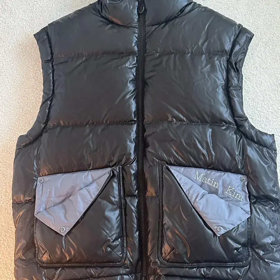 마뗑킴 패딩 조끼 FOLDED POCKET DOWN VEST MEN