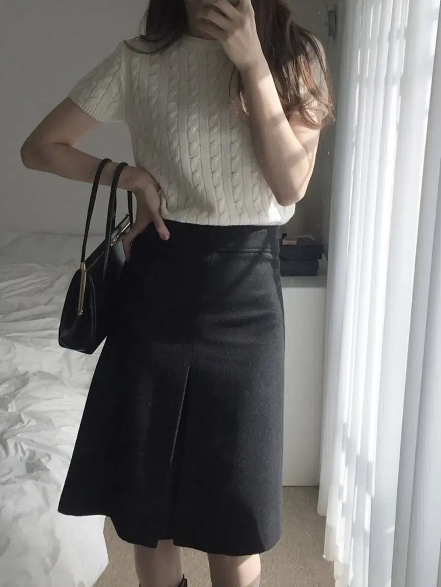 Slit black skirt in mulette wool