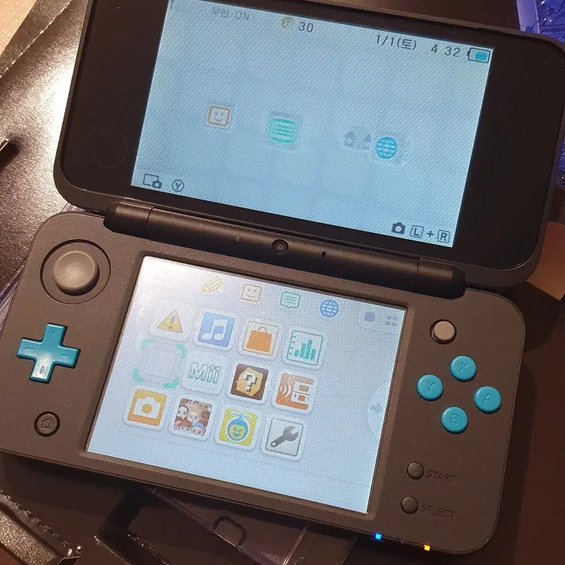 뉴 닌텐도 2DS XL 터쿼이즈블루 (충전기없음)