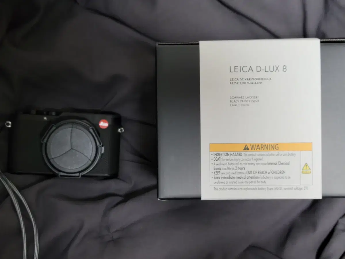 I have a mint condition Leica D-lux8 for sale [please read the description].