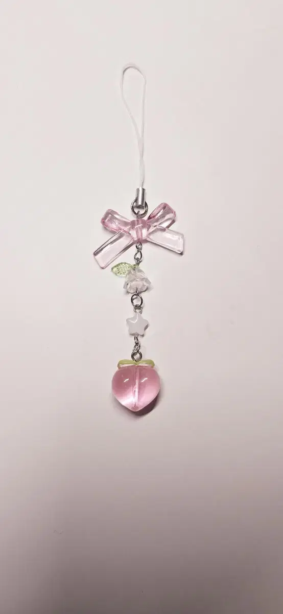 Ribbon peach beaded keyring (the last one is an extra keyring you get all 3)