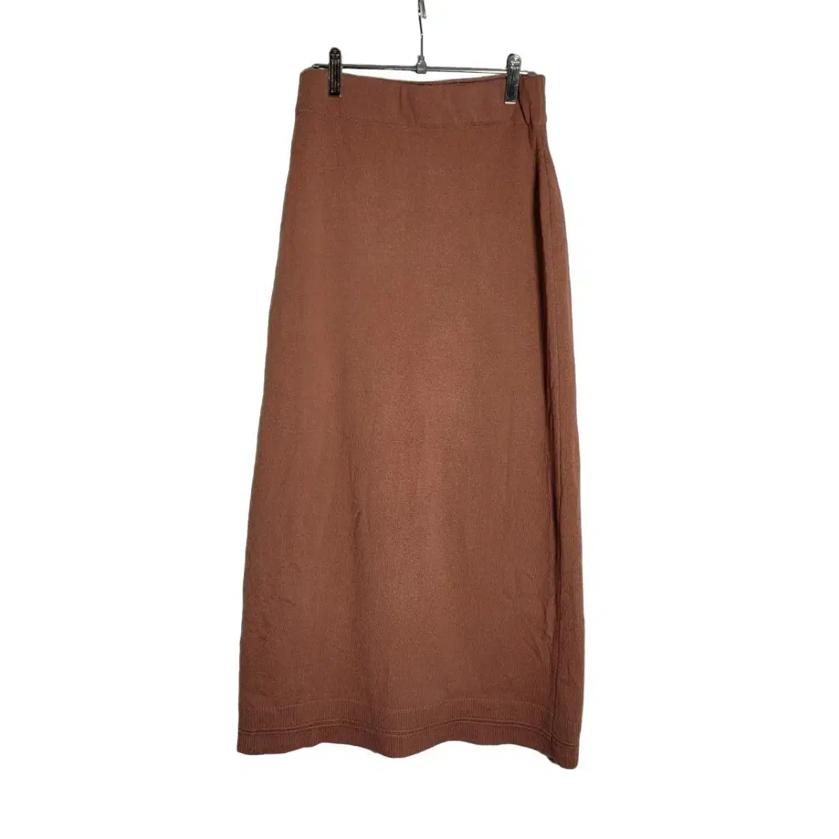 Long knit skirt in a wool blend brick color, very good condition.