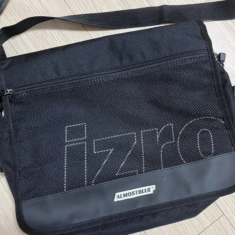 ALMOSTBLUE X IZRO MESSENGER BAG