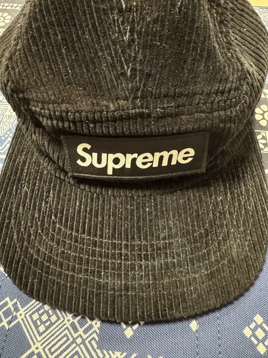 SUPREME CAMO CORDUROY CAMP CAP (bk)