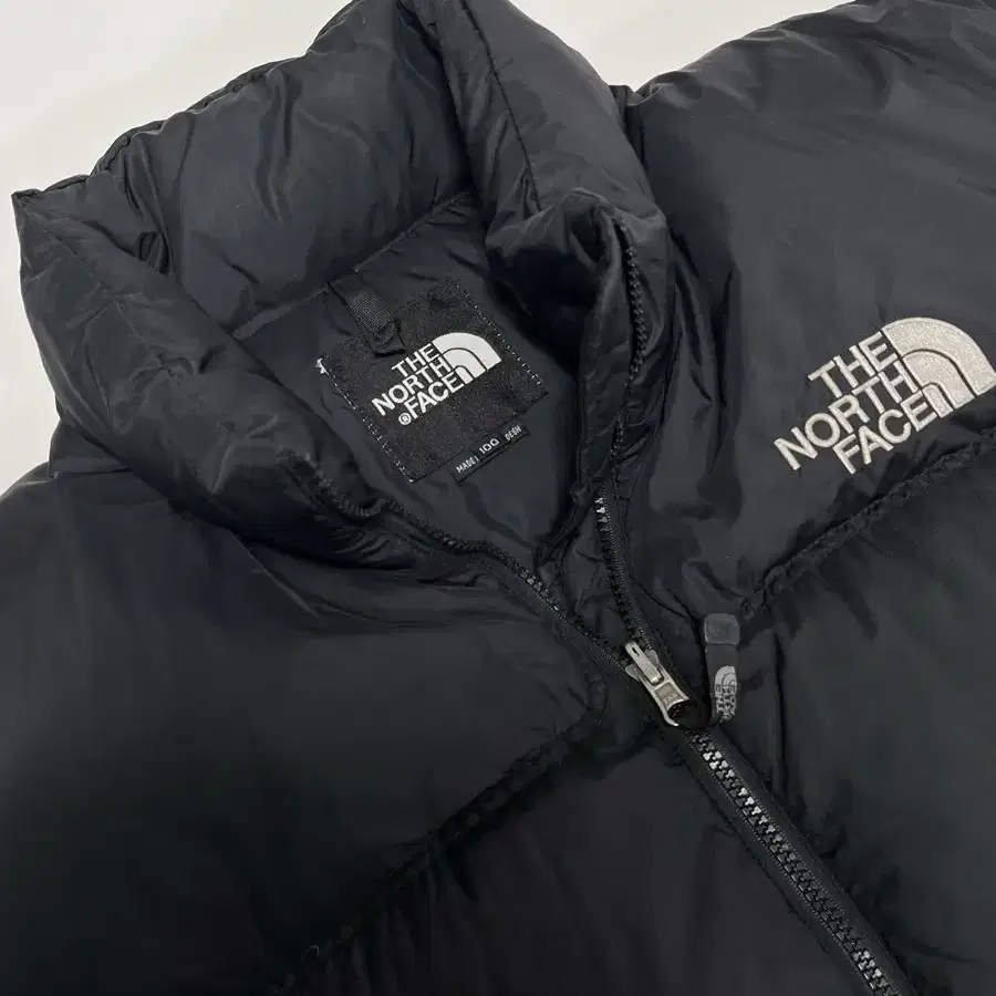 NORTHFACE 노스페이스 눕시 700 매트블랙 100