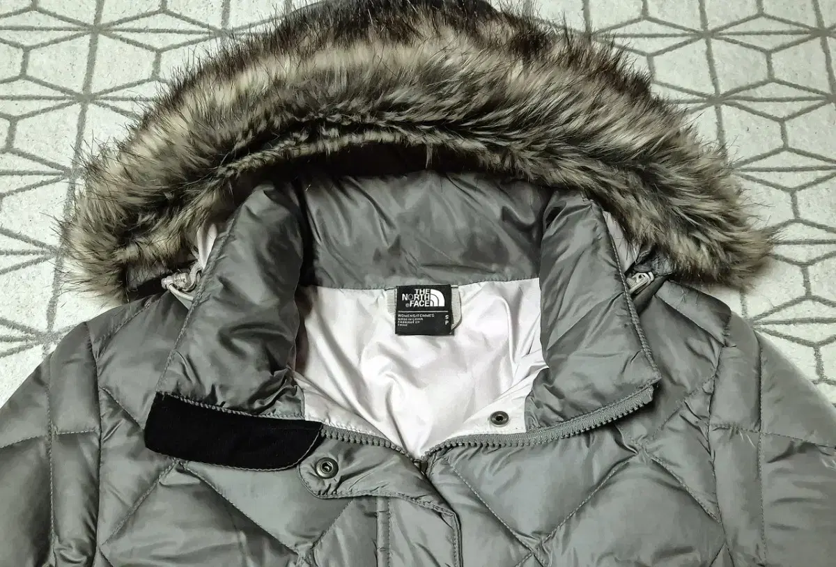 The North Face Goose Down Padding Sells