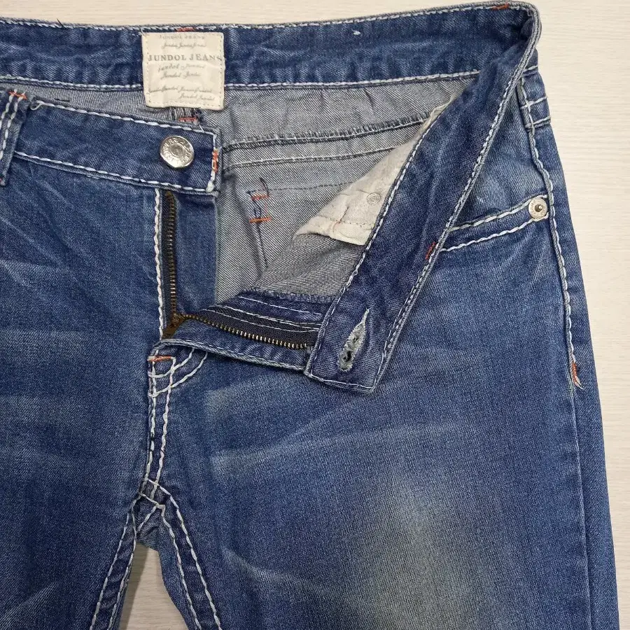 33 JUNDOL JEANS 골반 워싱 스판 부츠컷 33-357