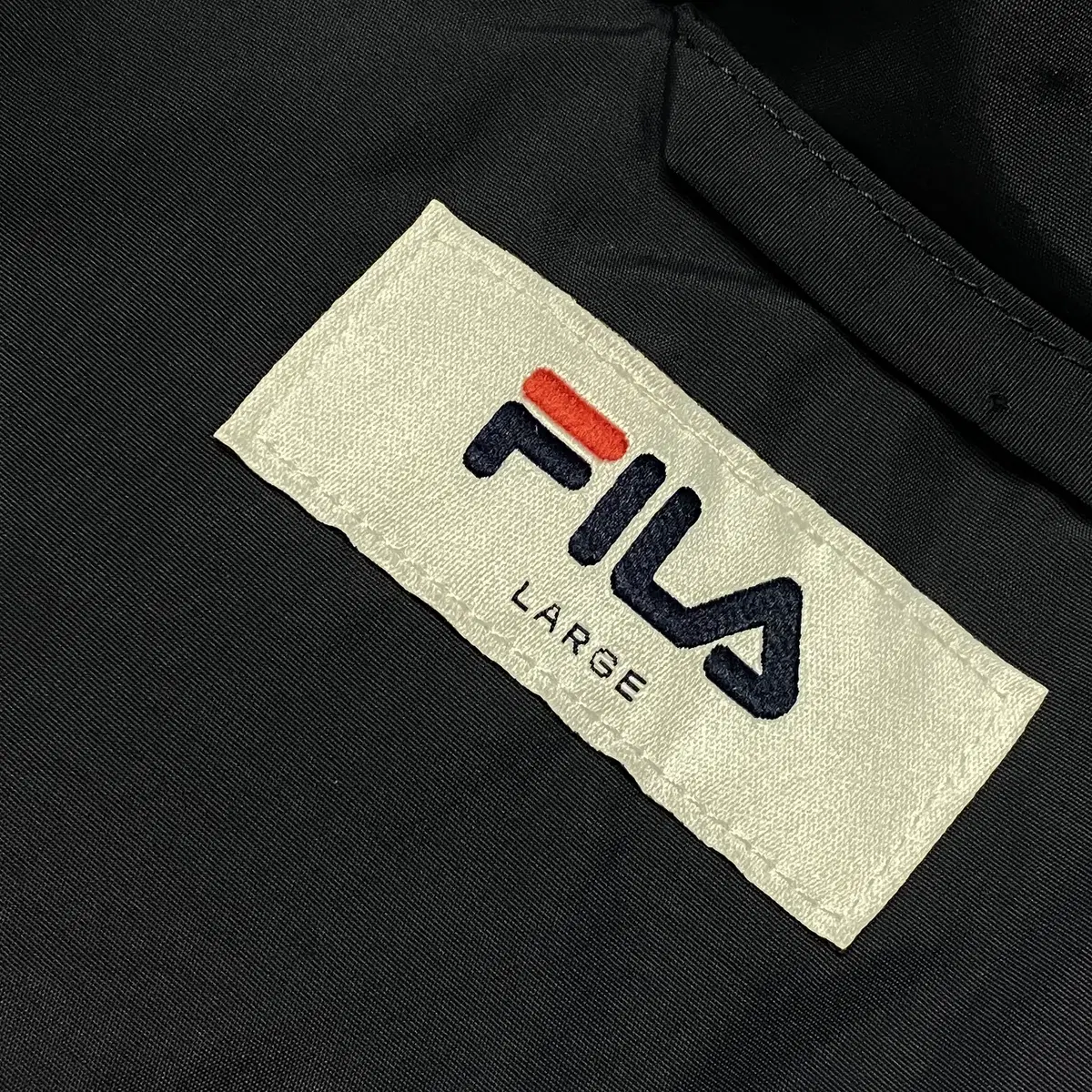 910. FILA 휠라 패딩 (L)