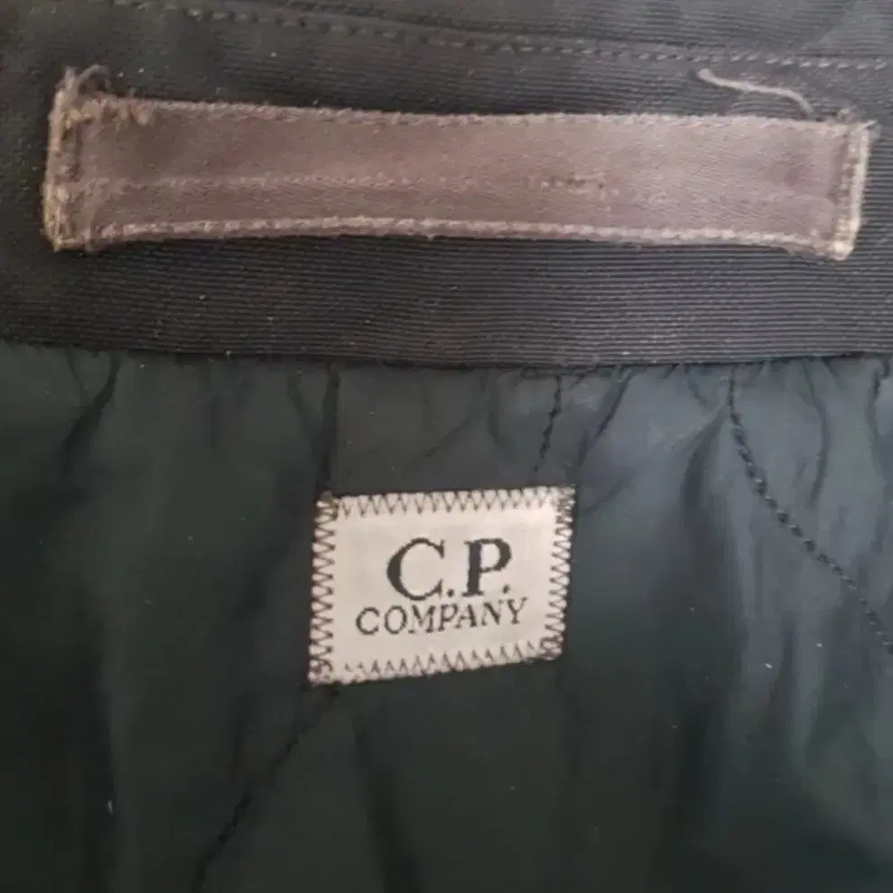 보온재가 있는 CP COMPANY 가먼트다잉 맥코트