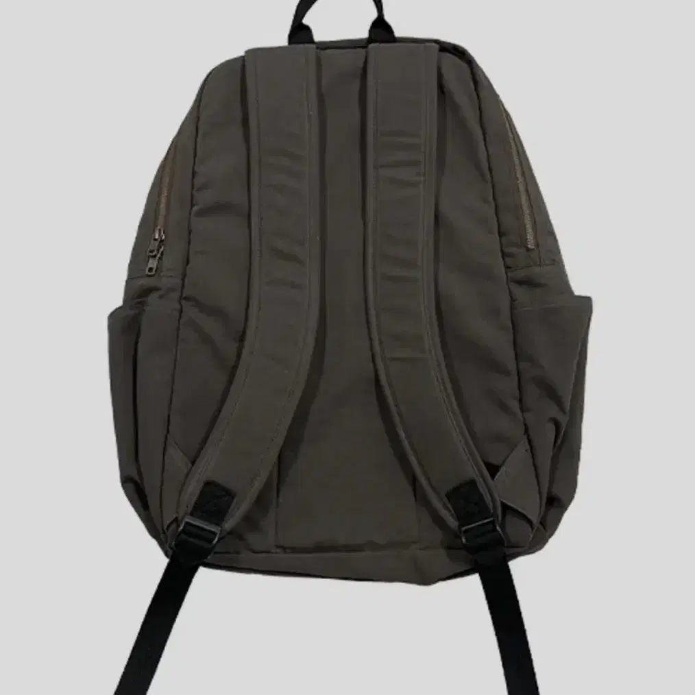 더콜디스트모먼트 브라운 백팩 TCM logo backpack